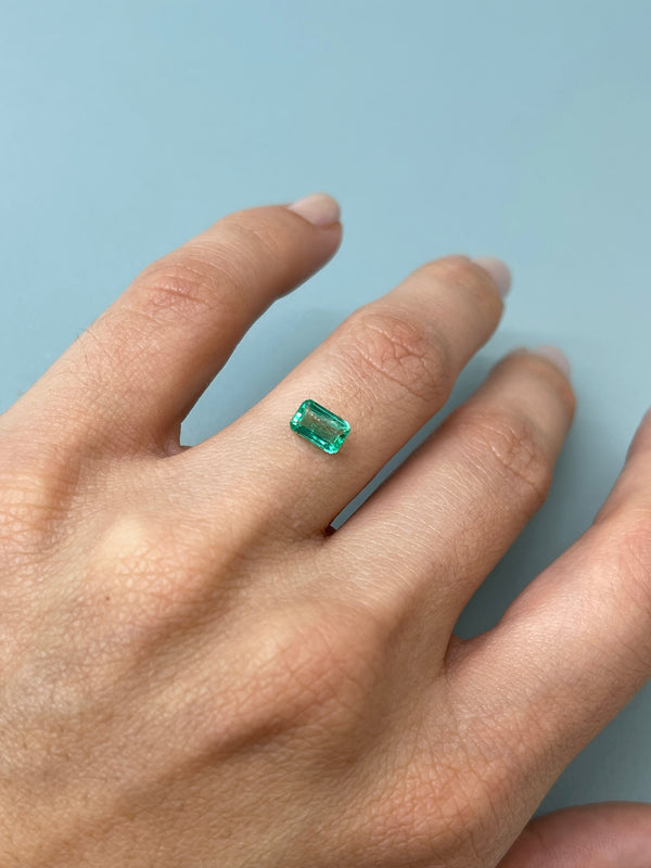 0.77 Carat 7x4.5 Glowy Loose Colombian Emerald-Emerald Cut
