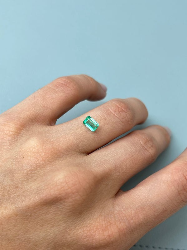 0.77 Carat 7x4.5 Glowy Loose Colombian Emerald-Emerald Cut