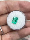 2.31 Carat 10x7 Freckled Medium Green Emerald Cut Colombian Emerald