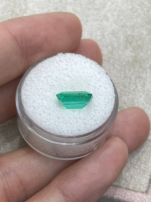 2.31 Carat 10x7 Freckled Medium Green Emerald Cut Colombian Emerald