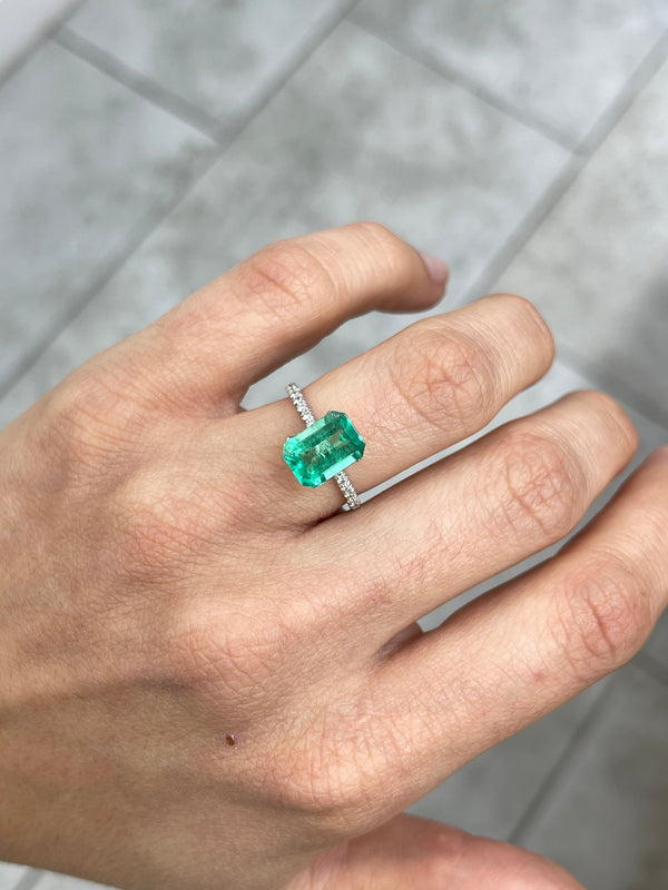 2.31 Carat 10x7 Freckled Medium Green Emerald Cut Colombian Emerald