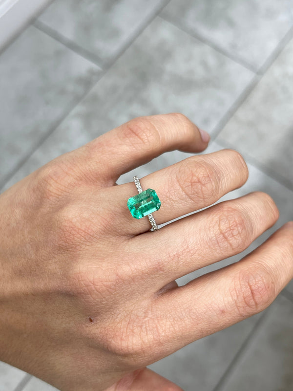2.31 Carat 10x7 Freckled Medium Green Emerald Cut Colombian Emerald