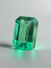 2.31 Carat 10x7 Freckled Medium Green Emerald Cut Colombian Emerald