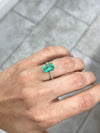 2.31 Carat 10x7 Freckled Medium Green Emerald Cut Colombian Emerald